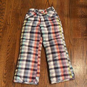 Cherokee snow pants. Girls size 7-8. Zipper pockets and elastic boot liner.